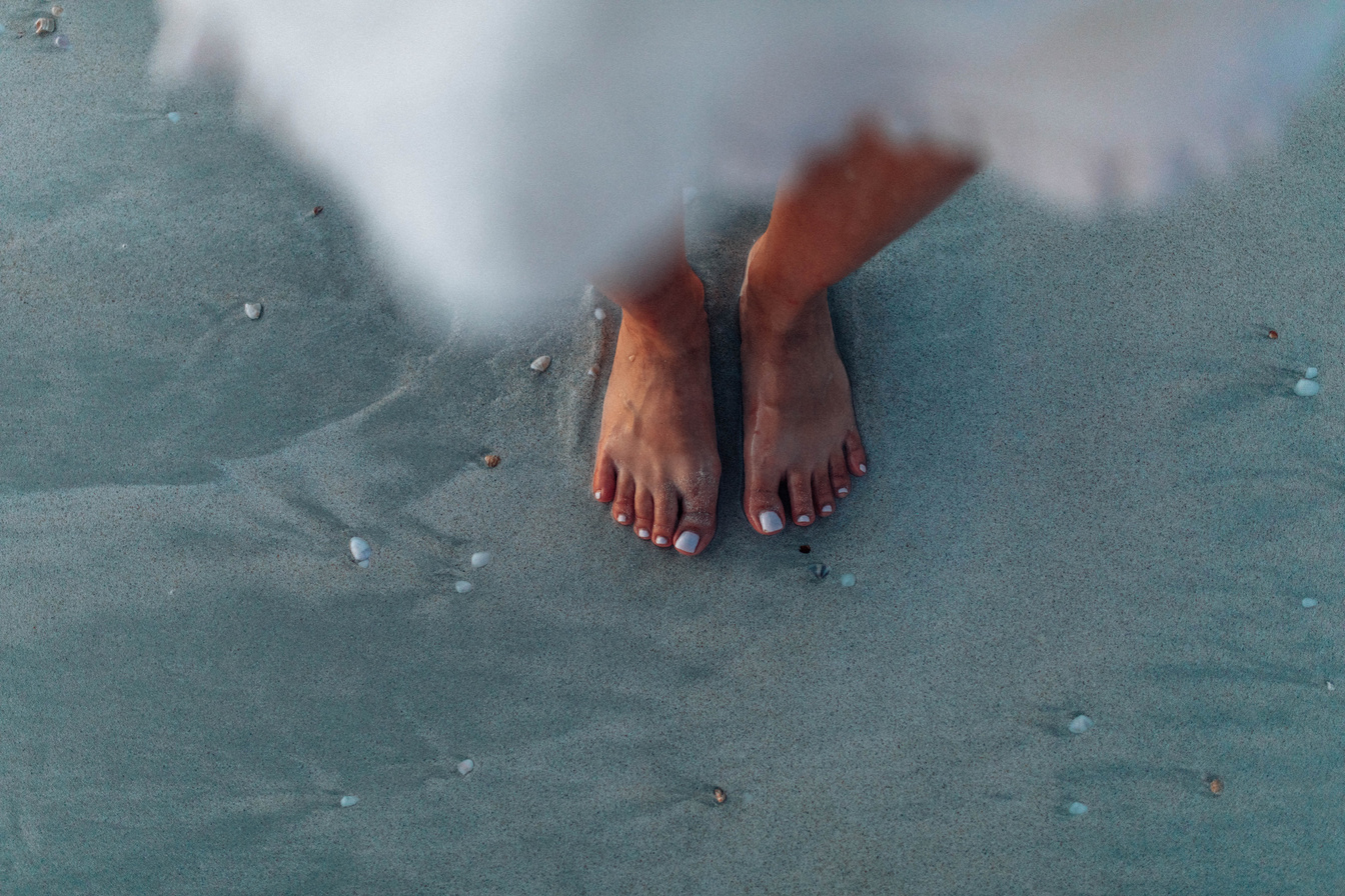 Female Feet on Sand